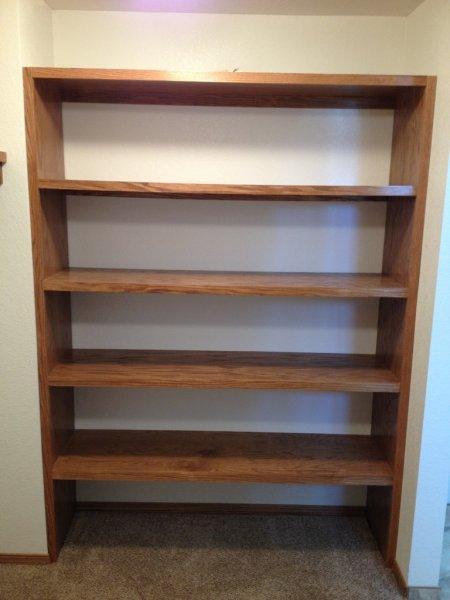 https://www.sandaconstructioninc.net/images/phocagallery/bars-entertainment-woodworking/oak-closet-shelves/thumbs/phoca_thumb_l_oak%20shoe%20organizer%202.jpg