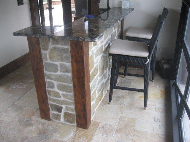 https://www.sandaconstructioninc.net/images/phocagallery/bars-entertainment-woodworking/stone-wet-bar/thumbs/phoca_thumb_l_stone-wet-bar-with-granite%20top.jpg