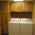 Hickory Cabinets above Washer/Dryer